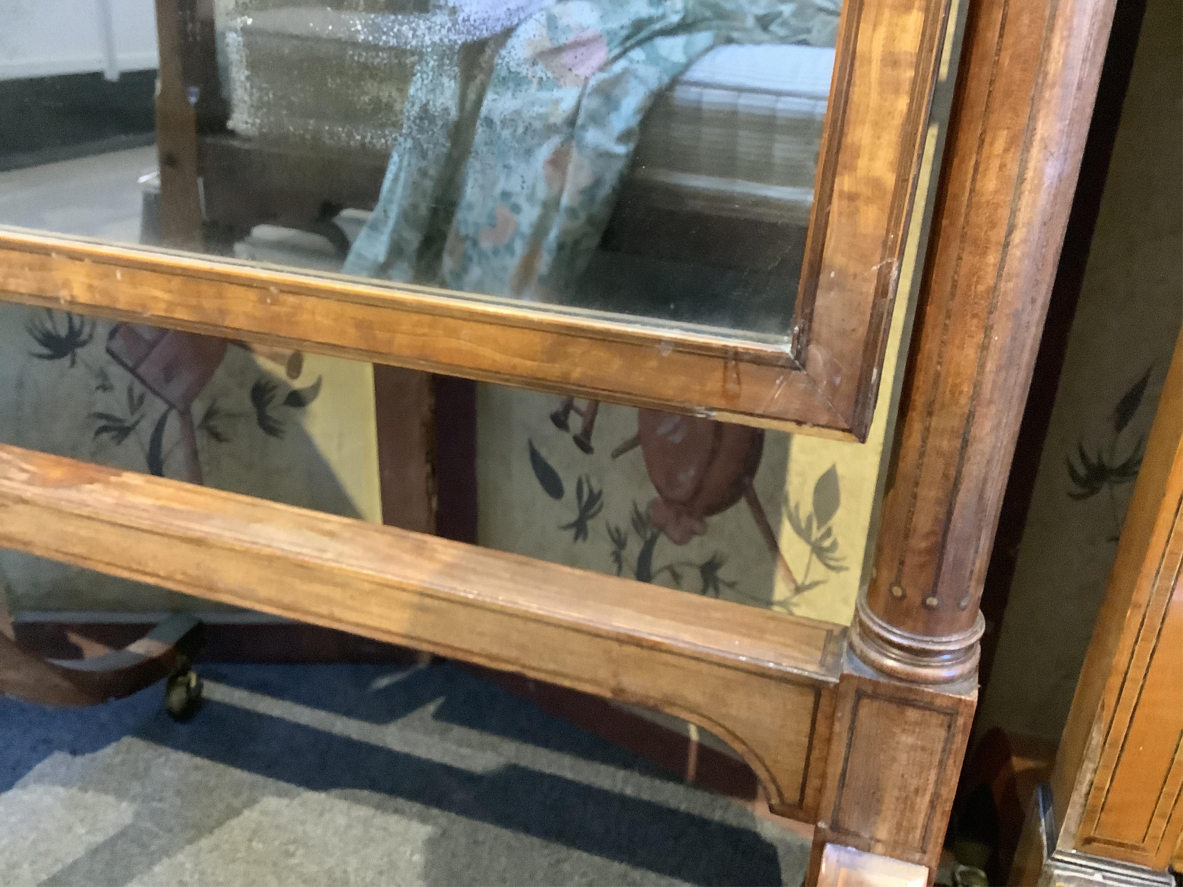 A Regency inlaid mahogany cheval mirror